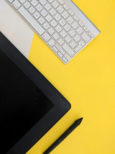 Photo by Georgie Cobbs gray Apple wireless keyboard beside black tablet computer and stylus pen